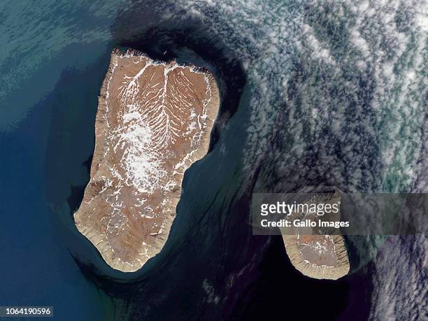 The Diomede Islands in the Bering Strait are separated by the International Date Line with Big Diomede Island 21 hours ahead of Little Diomede on...