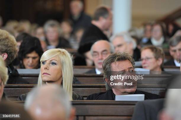 Actor Jan Vedder and his wife Marion attend the memorial service for Loki Schmidt, wife of former German Chancellor Helmut Schmidt, at the St....