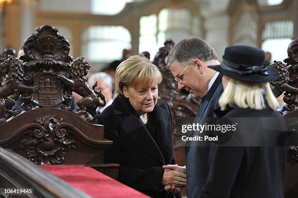 German Chancellor Angela Merkel and Hamburgs mayor Christioh Ahlhaus with his wife Simone attend the memorial service for Loki Schmidt, wife of...