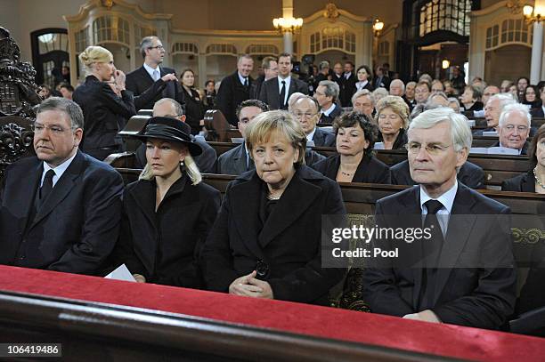 Hamburg's Mayor Christoph Ahlhaus, his wife Simone, German Chancellor Angela Merkel, former Hamburg Mayor Henning Voscherau attend the memorial...