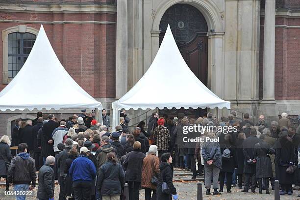 Guests are seen outside the memorial service for Loki Schmidt, wife of former German Chancellor Helmut Schmidt, at the St. Michaelis Kirche on...