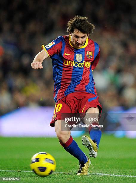 Lionel Messi of Barcelona scores his second goal during the La Liga match between Barcelona and Sevilla FC on October 30, 2010 in Barcelona, Spain....