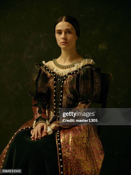 Portrait of a girl wearing a retro princess or countess dress