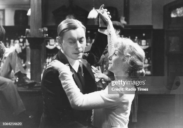 Actors Hywel Bennett and Cheryl Campbell dancing together in a scene from the television series 'Pennies from Heaven', January 23rd 1978.