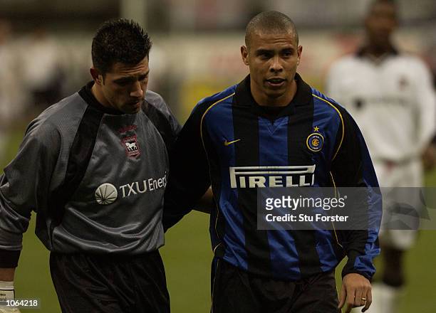 Ronaldo of Inter consoles Matteo Sereni of Ipswich after the UEFA Cup Third Round, Second Leg match between Inter Milan and Ipswich Town, at the San...