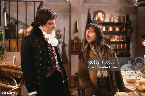 Actors Rowan Atkinson and Tony Robinson in a scene from the BBC television sitcom 'Black Adder the Third', July 10th 1987.