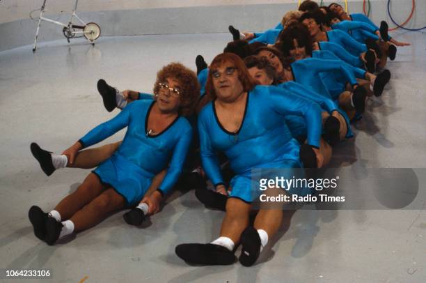 Comedians Ronnie Corbett and Ronnie Barker dressed as women, in a dance troupe sketch from the BBC Television series 'The Two Ronnie', circa 1980.
