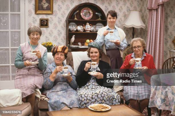 Portrait of actresses Juliette Kaplan, Kathy Staff, Jane Freeman, Sarah Thomas and Thora Hird drinking tea on the set of the BBC television sitcom...