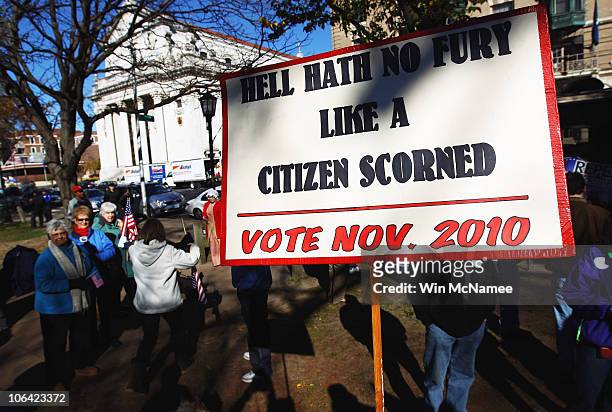 Sign is held during a Tea Party Express rally on Waterbury Green November 1, 2010 in Waterbury, Connecticut. Midterm elections are scheduled to be...