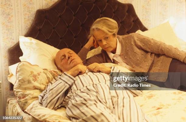 Actors Richard Wilson and Annette Crosbie in a bedroom scene from episode 'The Wisdom of the Witch' of the BBC Television sitcom 'One Foot in the...