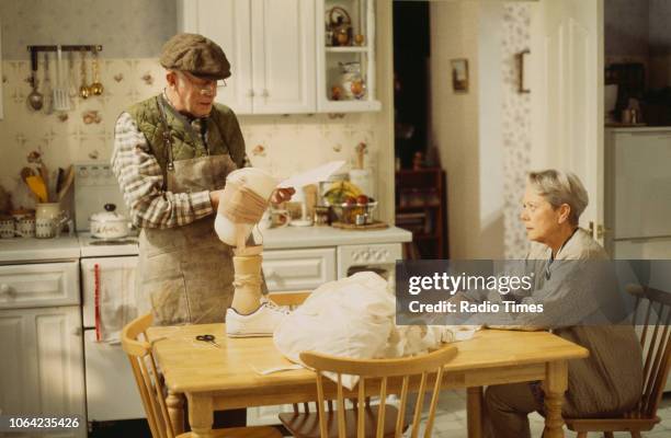 Actors Richard Wilson and Annette Crosbie in a kitchen scene from the Christmas special episode 'Starbound' of the BBC Television sitcom 'One Foot in...