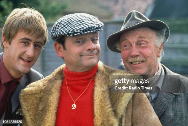 Portrait of actors Nicholas Lyndhurst, David Jason and Lennard Pearce on the set of the BBC Television sitcom 'Only Fools and Horses', circa 1983.