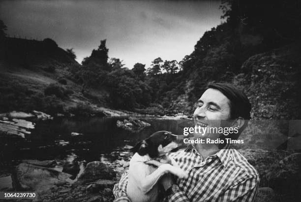 Outdoor portrait of politician David Steel MP with his pet dog, July 1976.