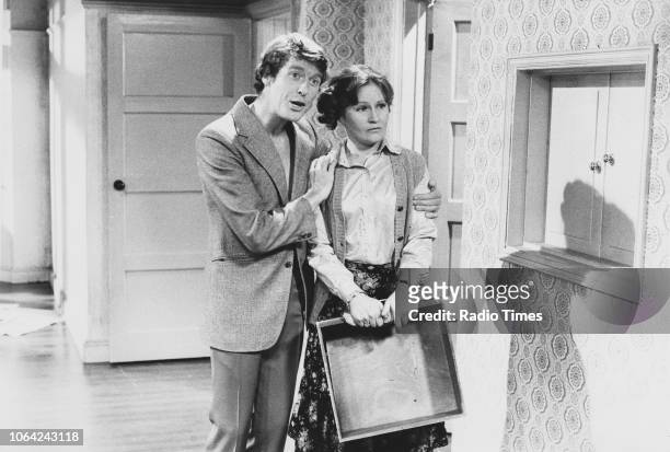 Actors Michael Crawford and Michele Dotrice in a scene from episode 'Moving House' of the television sitcom 'Some Mothers Do 'Ave 'Em', October 8th...
