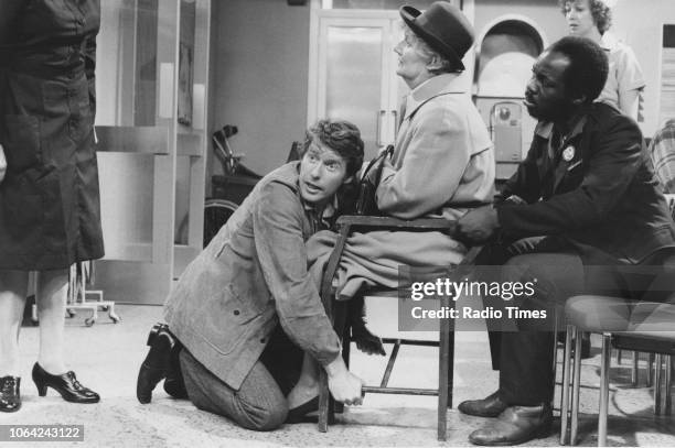 Actors Michael Crawford, Hazel Bainbridge and Carl Andrews in a scene from episode 'Wendy House' of the television sitcom 'Some Mothers Do 'Ave 'Em',...
