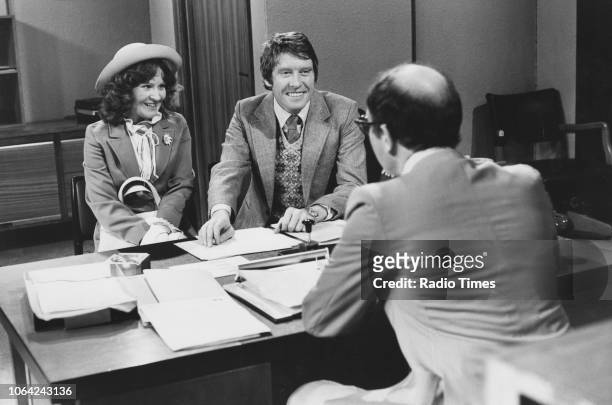 Actors Michael Crawford, Michele Dotrice and Edward Hardwicke in a scene from episode 'Australia House' of the television sitcom 'Some Mothers Do...