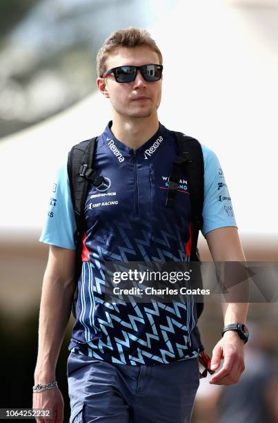 Sergey Sirotkin of Russia and Williams walks in the Paddock during previews ahead of the Abu Dhabi Formula One Grand Prix at Yas Marina Circuit on...