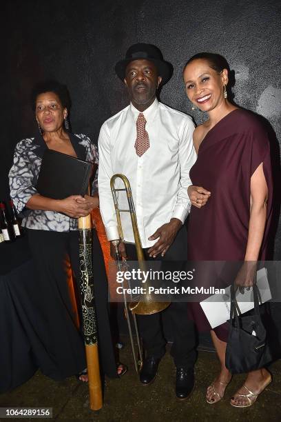 Carrie Mae Weems, Craig Harris and Pamela Newkirk attend 2018 Aperture Gala at Cedar Lake on October 30, 2018 in New York City.