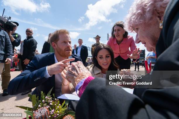 Prince Harry, Duke of Sussex and Meghan, Duchess of Sussex greet Daphne Dunne at Sydney Opera House on October 16, 2018 in Sydney, Australia. The...