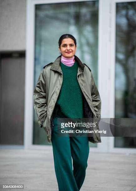 Leyla Piedayesh is seen wearing green pants, knit and olive jacket outside Lala Berlin lunch presenting SS19 collection on November 22, 2018 in...