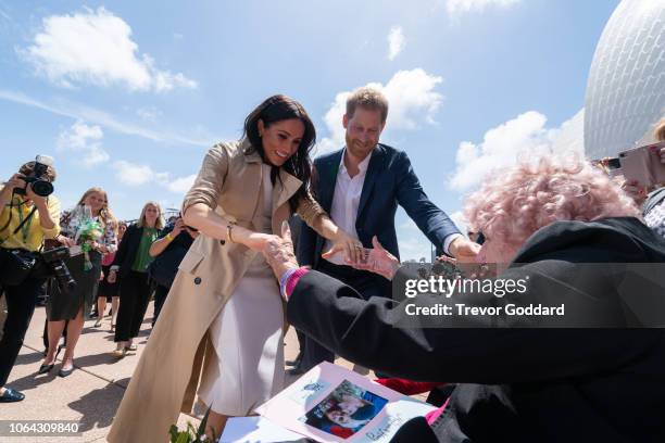 Prince Harry, Duke of Sussex and Meghan, Duchess of Sussex greet Daphne Dunne at Sydney Opera House on October 16, 2018 in Sydney, Australia. The...