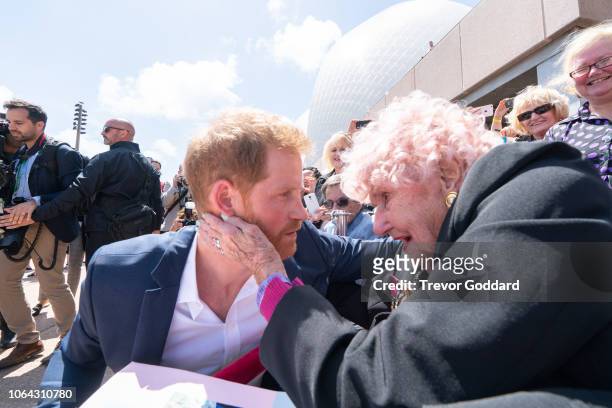 Prince Harry, Duke of Sussex and Meghan, Duchess of Sussex greet Daphne Dunne at Sydney Opera House on October 16, 2018 in Sydney, Australia. The...
