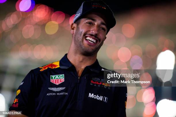 Daniel Ricciardo of Australia and Red Bull Racing talks to the media in the Paddock during previews ahead of the Abu Dhabi Formula One Grand Prix at...