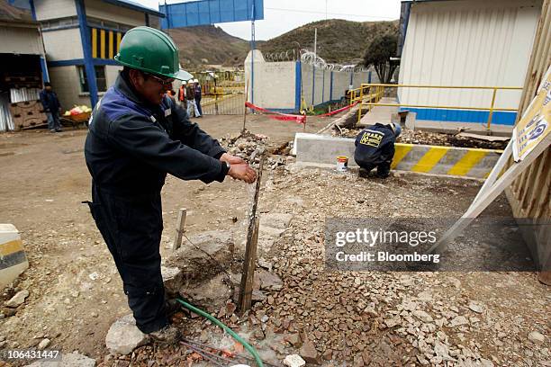 Worker washes his hands at Chinalco's temporary base of mining operations at the Toromocho Project in Morococha, Peru, on Monday, April 5, 2010....