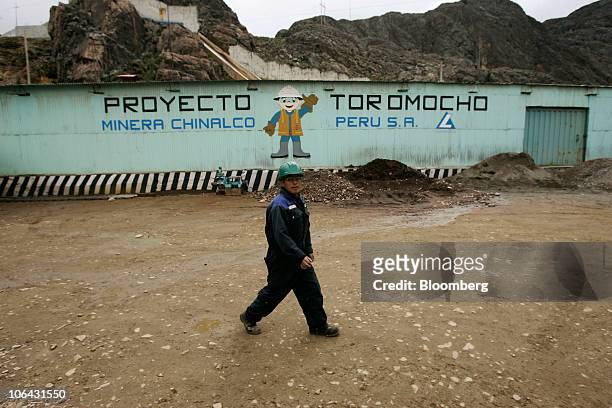 Worker walks at Chinalco's temporary base of mining operations at the Toromocho Project in Morococha, Peru, on Monday, April 5, 2010. Aluminum Corp....
