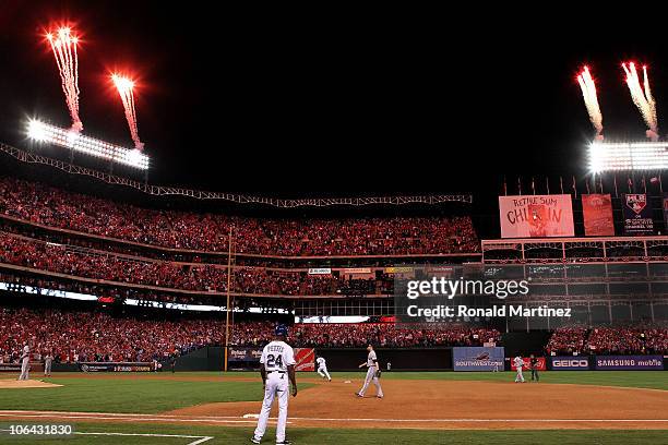 Fireworks are lite off as Nelson Cruz of the Texas Rangers rounds the bases on his solo home in the seventh inning against Tim Lincecum of the San...