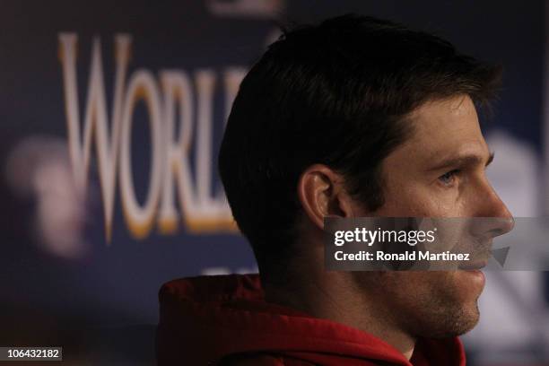 Losing pitcher Cliff Lee of the Texas Rangers looks on from the dugout against the San Francisco Giants in Game Five of the 2010 MLB World Series at...