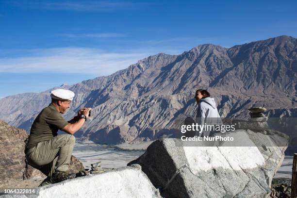 Khaplu, Pakistan, 28 September 2018. Trekkers admire the view from the Khaplu Thoqsikhar, an ancient fort of the Yabgo rulers. Khaplu is a sprawling...