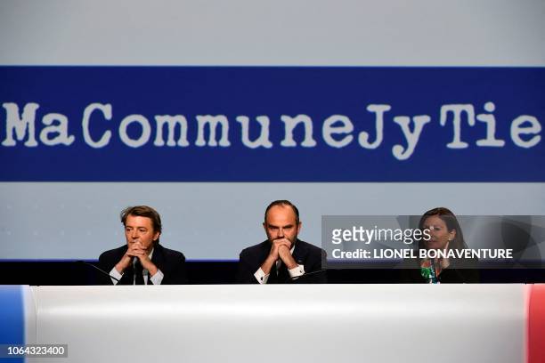 French Prime Minister Edouard Philippe , next to Troyes Mayor and President of the Association of Mayors of France Francois Baroin and Paris Mayor...