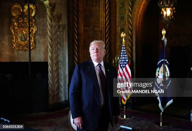 President Donald Trump departs after speaking to military members via teleconference from his Mar-a-Lago resort in Palm Beach, Florida on November...