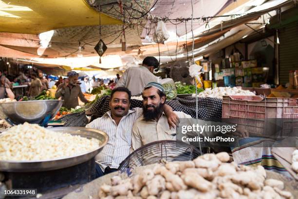 Karachi, Pakistan, 8 October 2018. Portrait of a fruit and vegetable merchants at the Empress market. It is amongst the most popular and busy places...