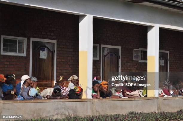 Women victims of sexual violence and treated at the Panzi hospital seen following a prayer session mixed with other women suffering from other...