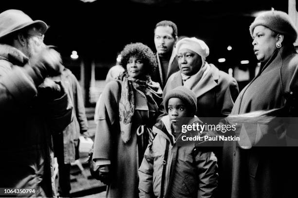 Actresses Cicely Tyson, Esther Rolle , and Della Reese , on the film set for the movie 'The Kid Who Loved Christmas' at Union Station in Chicago,...