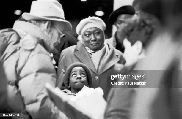 Actress Esther Rolle , center, filming 'The Kid Who Loved Christmas' at Union Station in Chicago, Illinois, February 12, 1990.