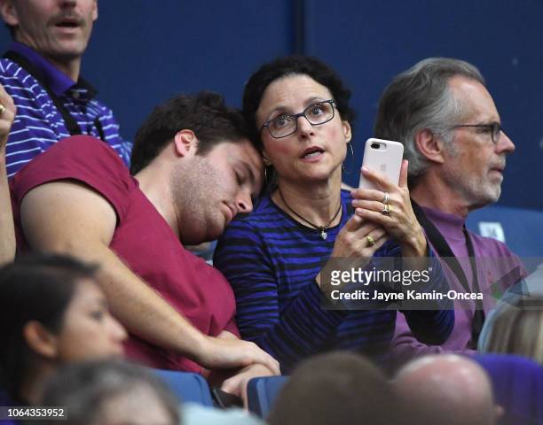 Actress Julia Louis-Dreyfus, husband Brad Hall and son Henry Hall attend the 2018 Wooden Legacy to watch their son & brother Charlie Hall play for...