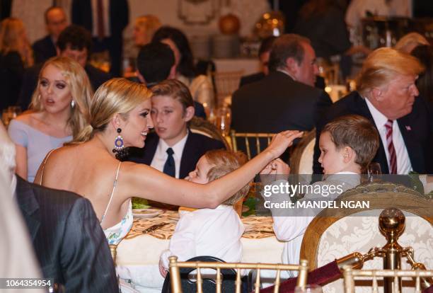 Ivanka Trump is seen with her sons Joseph Kushner and Theodore Kushner during Thanksgiving dinner with US President Donald Trump , Tiffany Trump and...