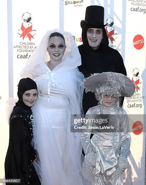 Eva La Rue, Joe Cappuccio and children attend CAAF's 17th annual Dream Halloween at Barker Hangar on October 30, 2010 in Santa Monica, California.