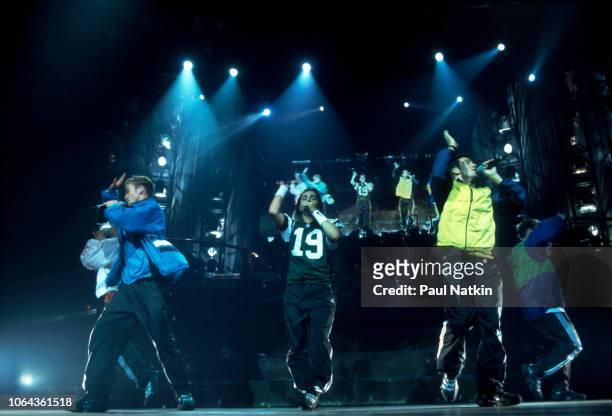 Left to right, Joey Fatone, Justin Timberlake, Chris Kirkpatrick, JC Chasez, and Lance Bass of the music group N'Sync perform on stage at the...