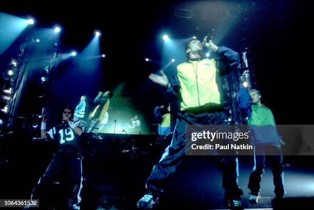 Left to right, Chris Kirkpatrick, JC Chasez, and Lance Bass of the band N'Sync, perform on stage at the Rosemont Horizon in Rosemont, Illinois, March...