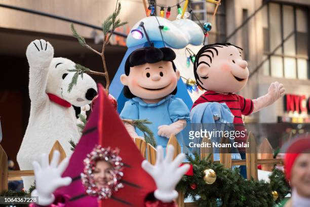 Snoopy, Lucy van Pelt and Linus van Pelt attend the 2018 Macy's Thanksgiving Day Parade on November 22, 2018 in New York City.