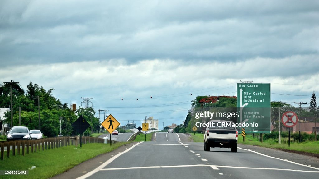 Car and truck traffic on the highway.