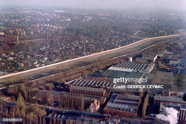 Aerial view taken on November 17, 1989 of the Berlin Wall along the french area in West Berlin and the no man's land marking the border between East...