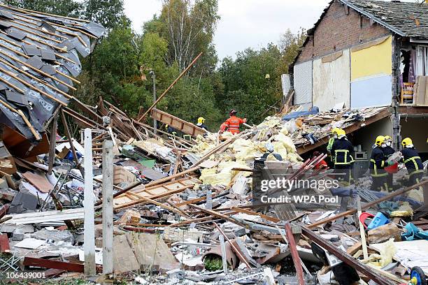 Emergency services attend the scene of a gas explosion in Irlam, Manchester today on November 2, 2010 in Manchester, England. Seven people have been...