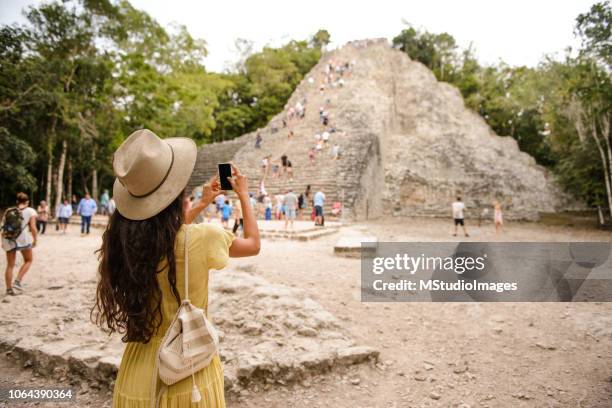 visiting in mexico. - coba stock pictures, royalty-free photos & images