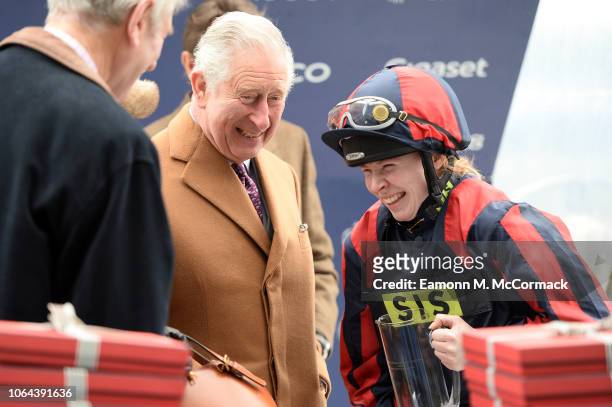Prince Charles, Prince of Wales presents to the Charity Race winning Jockey Rosie Margason at the PCF Racing Weekend And Shopping Fair at Ascot...
