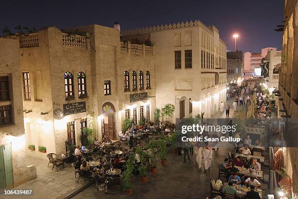 Tourists, expats and locals mix in the Souq Waqif on October 25, 2010 in Doha, Qatar. The Souq Waqif, with its myriad of little streets containing...